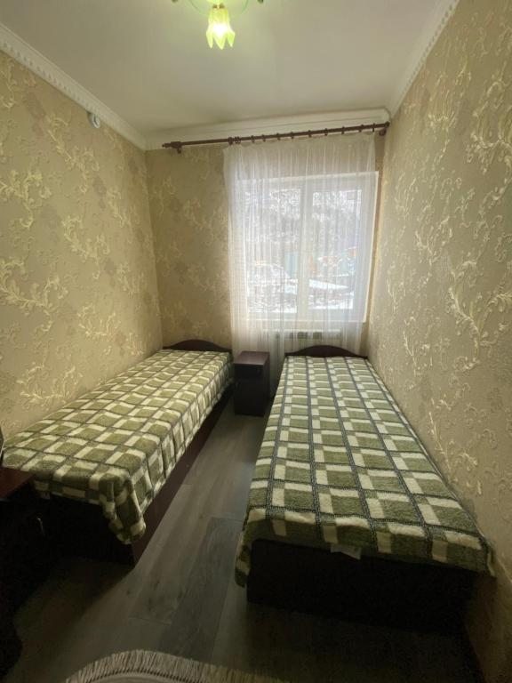 Двухместный (Бюджетный двухместный номер с 2 отдельными кроватями) отеля Эмен, Терскол