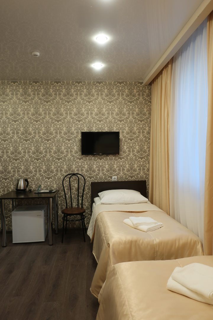 Двухместный (DBT - Двухместный номер с двумя раздельными кроватями) отеля Вознесенский, Петрозаводск