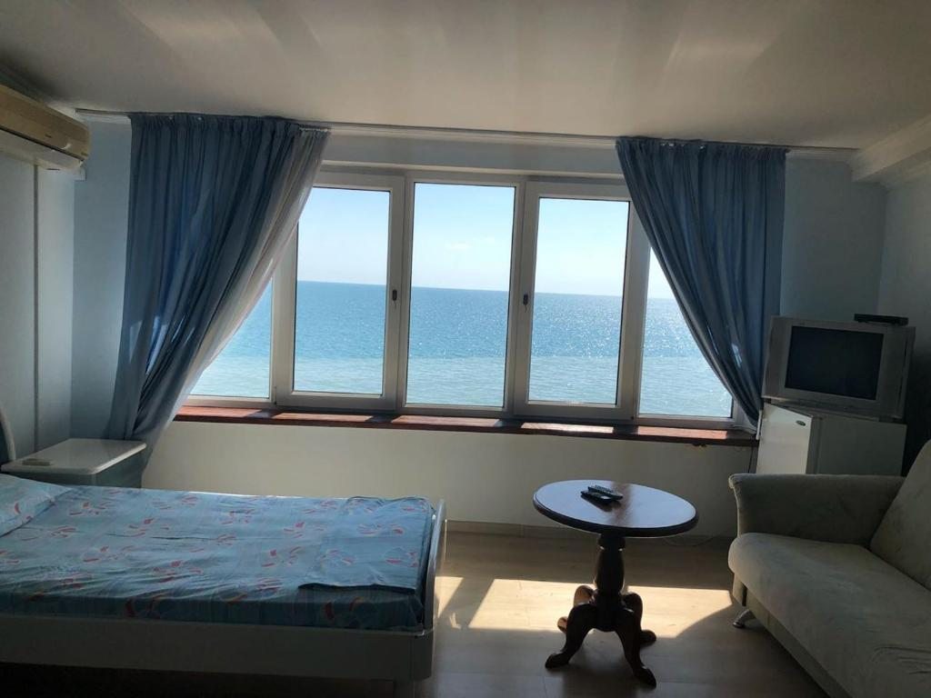 Трехместный (Трехместный номер Делюкс с видом на море), Эллинг-Лоо