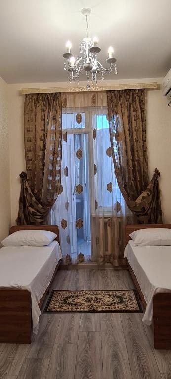 Двухместный (Двухместный номер с 2 отдельными кроватями и балконом) гостевого дома Валентина, Сочи