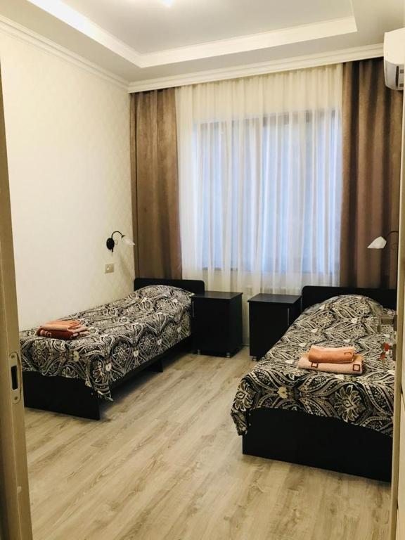 Двухместный (Двухместный номер с 2 отдельными кроватями и окном) гостевого дома Валентина, Лазаревское