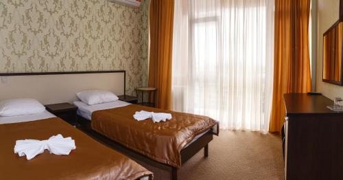 Двухместный (Двухместный номер с 2 отдельными кроватями) отеля Royal, Анапа