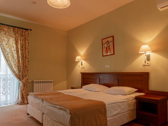 Фотография номера гостиницы Русская деревня