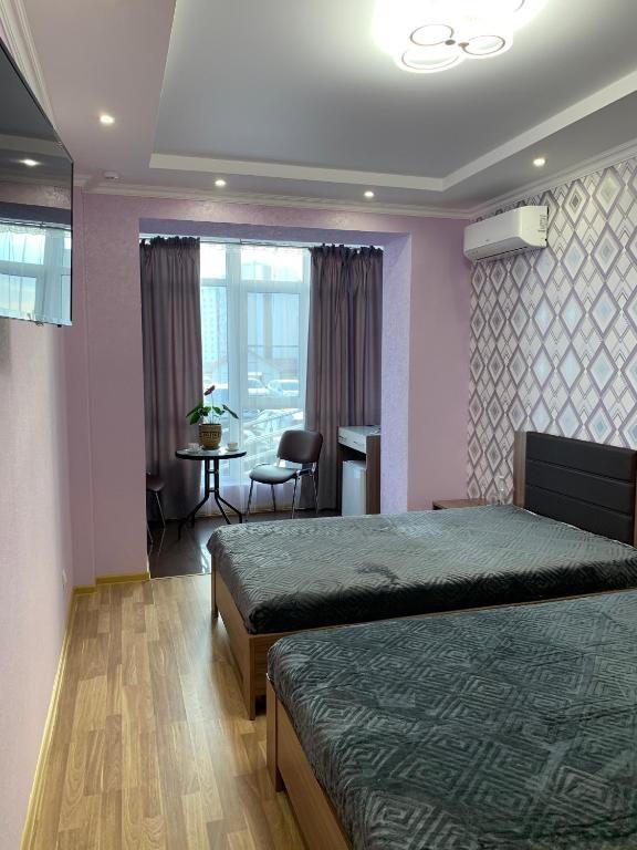 Двухместный (Двухместный номер Делюкс с 2 отдельными кроватями) гостиницы Чемодан, Пенза