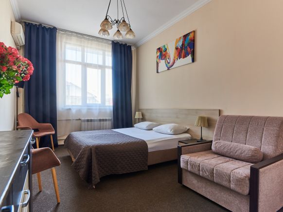 Фотография номера мини отеля Family Holiday Hotel