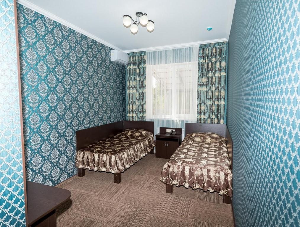 Двухместный (Двухместный номер с 2 отдельными кроватями и ванной комнатой) отеля Зеленый мыс, Невинномысск