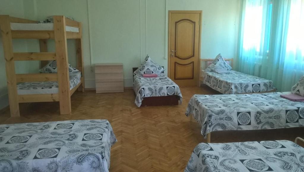 Номер (Односпальная кровать в общем номере) хостела Лотос, Краснодар