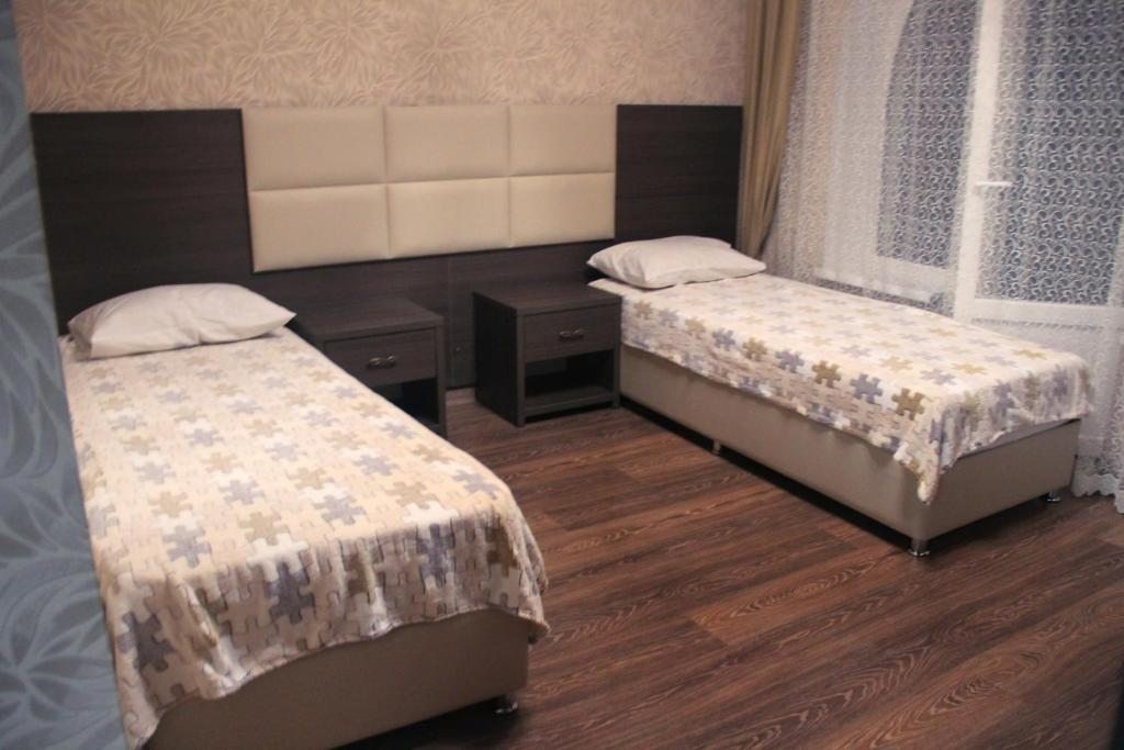 Двухместный (Бюджетный двухместный номер с 2 отдельными кроватями) отеля Motzart Hall, Ростов-на-Дону