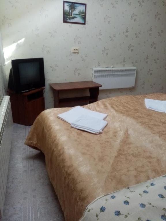Двухместный (Двухместный номер с 2 отдельными кроватями) гостевого дома Rostovchanka Guesthouse, Теберда