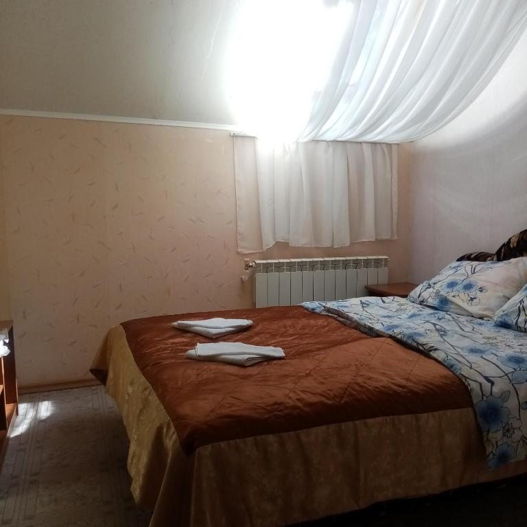 Четырехместный (Четырехместный номер с собственной ванной комнатой) гостевого дома Rostovchanka Guesthouse, Теберда