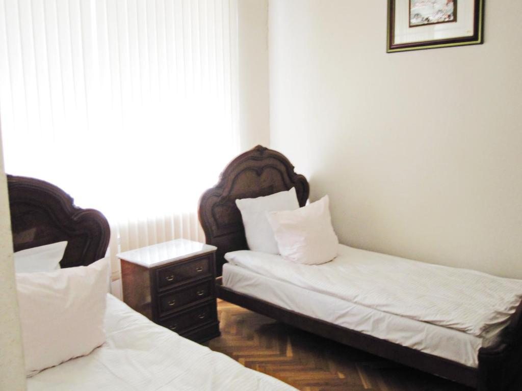 Двухместный (Двухместный номер с 2 отдельными кроватями и ванной комнатой) мини-гостиницы Динамо, Волгоград