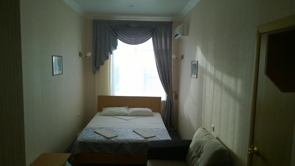 Двухместный (Улучшенный двухместный номер с 1 кроватью или 2 отдельными кроватями) мотеля Дубовка