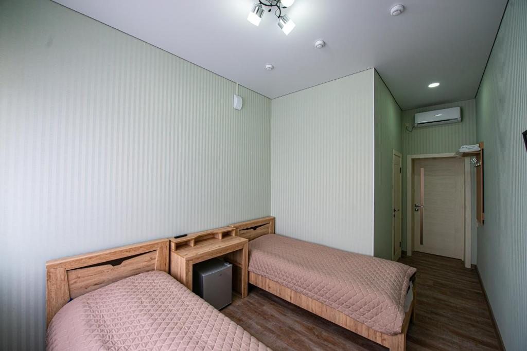 Двухместный (Двухместный номер с 2 отдельными кроватями) отеля ХМ, Невинномысск