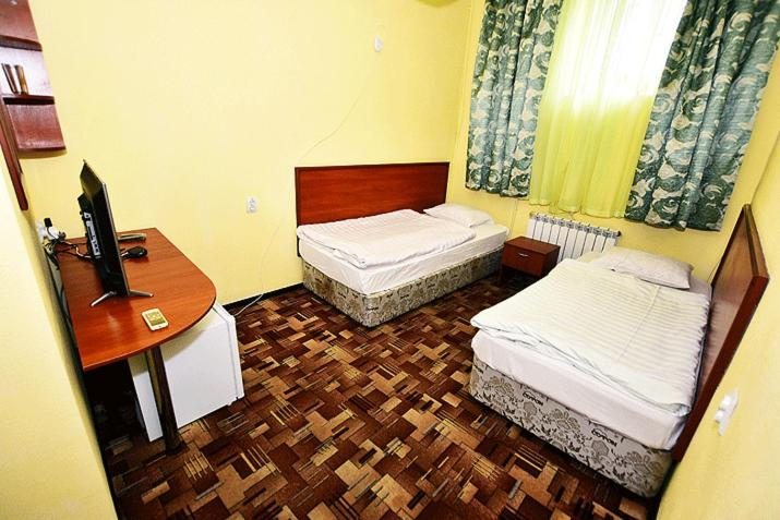 Двухместный (Бюджетный двухместный номер с 2 отдельными кроватями) отеля Нептун, Новороссийск