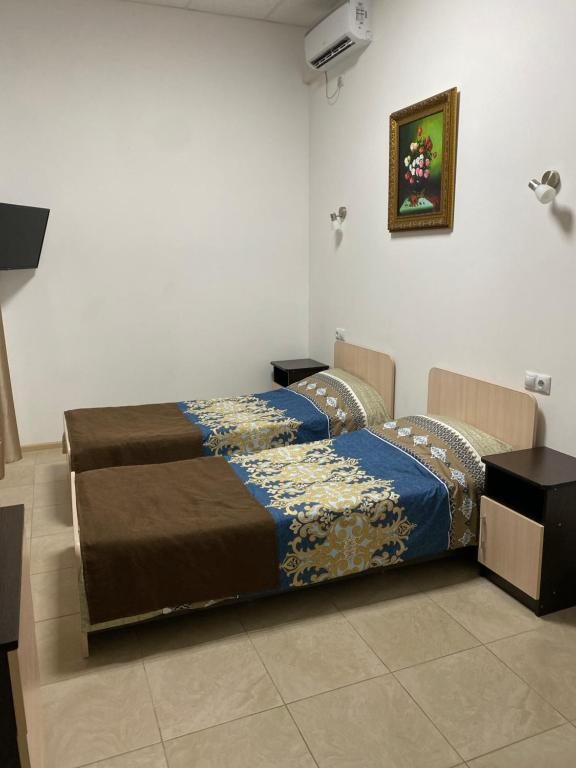 Двухместный (Двухместный номер с 2 отдельными кроватями) отеля Николь, Новороссийск
