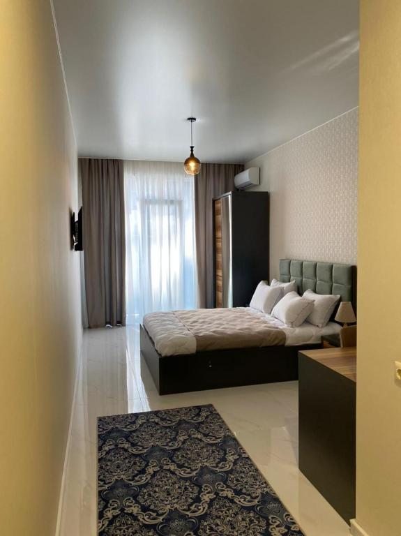 Двухместный (Двухместный номер Делюкс с 1 кроватью и балконом) отеля Horizons Hotel Rooms, Батуми