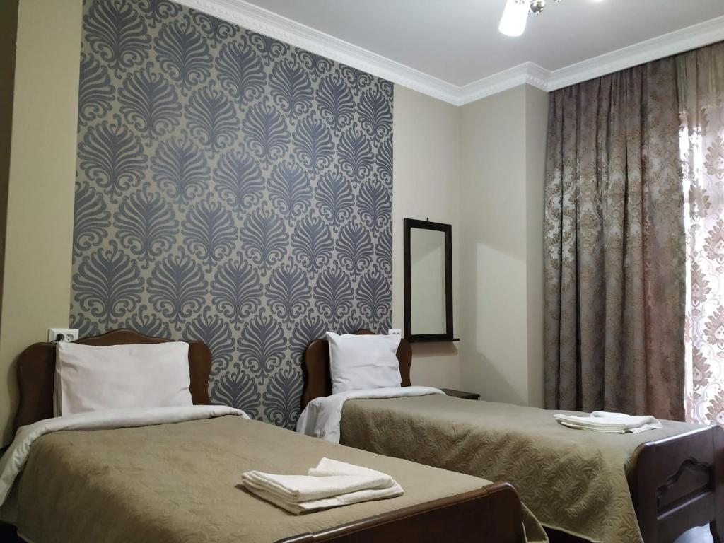 Двухместный (Бюджетный двухместный номер с 2 отдельными кроватями) отеля Batumi Home, Батуми