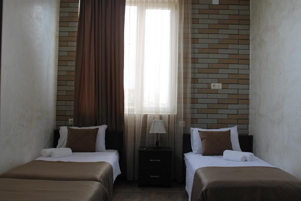 Двухместный (Стандартный двухместный номер с 2 отдельными кроватями) отеля Hotel Progress, Батуми