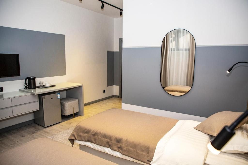 Двухместный (Бюджетный двухместный номер с 2 отдельными кроватями) отеля Maison, Бостери