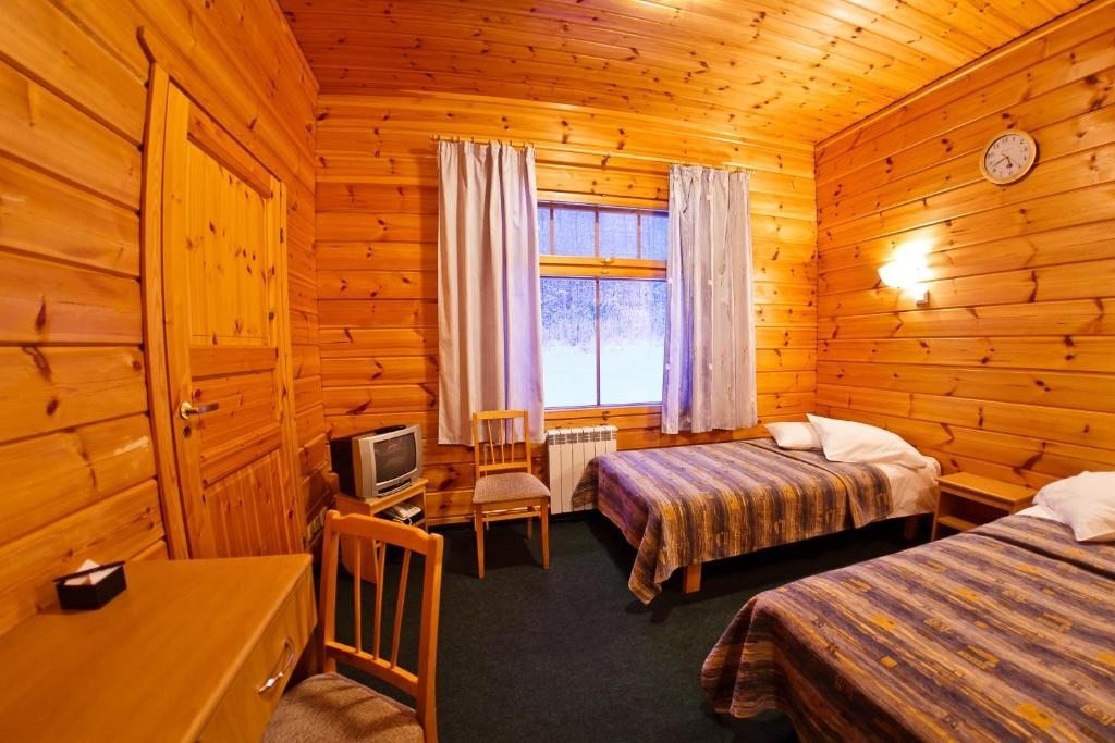 Двухместный (Двухместный номер с 2 отдельными кроватями) отеля HELIOPARK Eco & Spa Medical Karelia, Марциальные воды