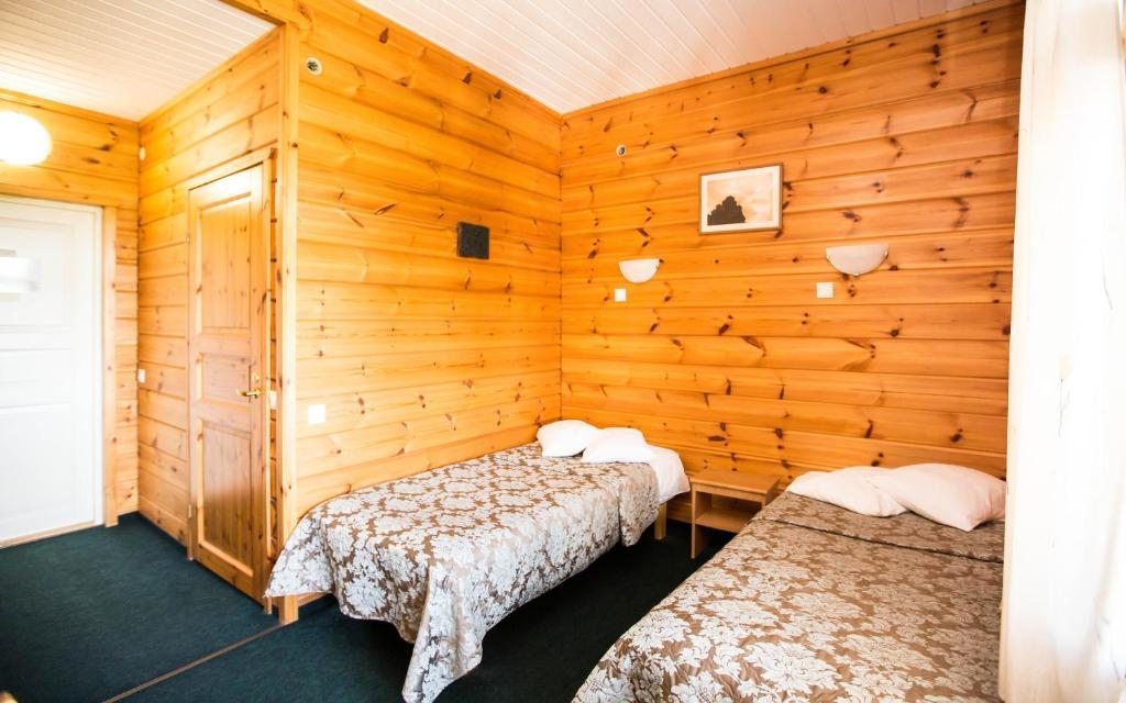 Двухместный (Двухместный номер с 2 отдельными кроватями и балконом) отеля HELIOPARK Eco & Spa Medical Karelia, Марциальные воды