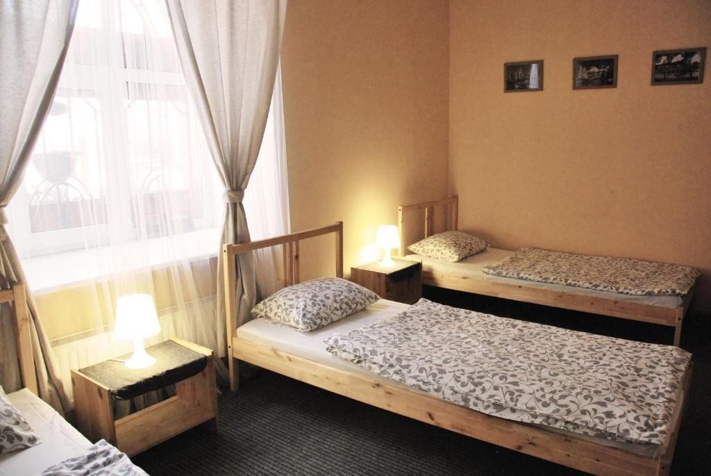 Трехместный Мужской (Кровать в общем трехместном номере для мужчин) хостела LikeHome, Санкт-Петербург