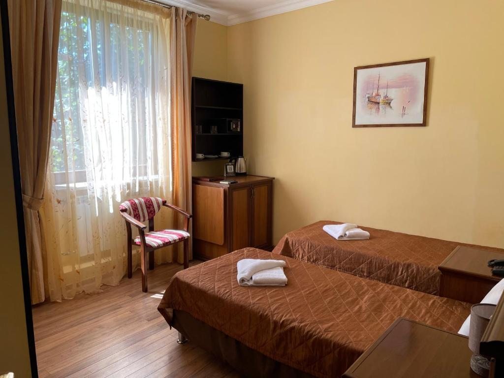 Двухместный (Стандартный двухместный номер с 1 кроватью или 2 отдельными кроватями) отеля Касабланка, Адлер