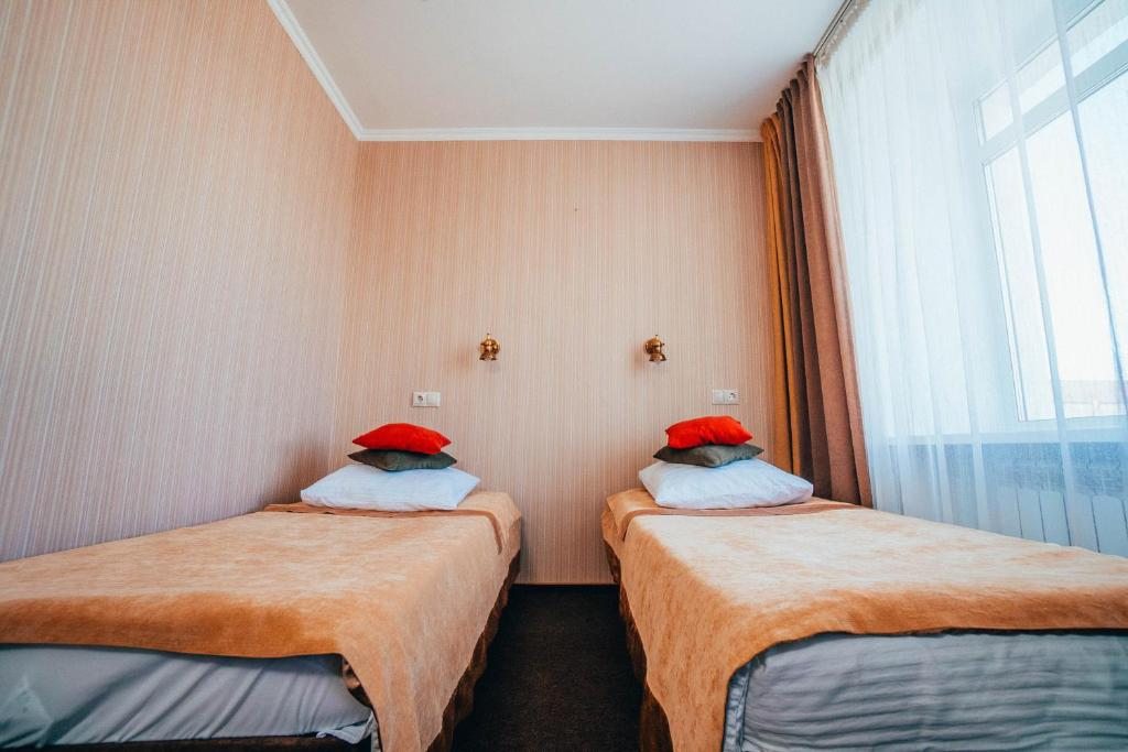 Двухместный (Двухместный номер с 2 отдельными кроватями) гостиницы Парус, Якутск