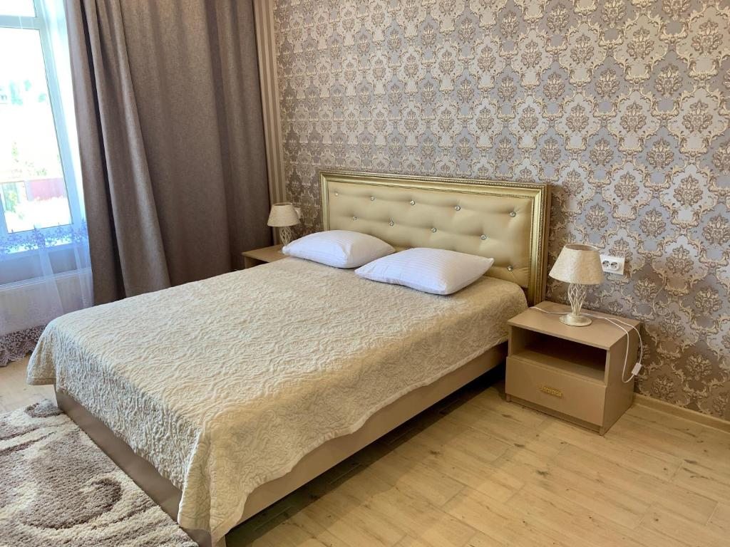 Двухместный (Улучшенный номер с кроватью размера «king-size») отеля Michell Сальск