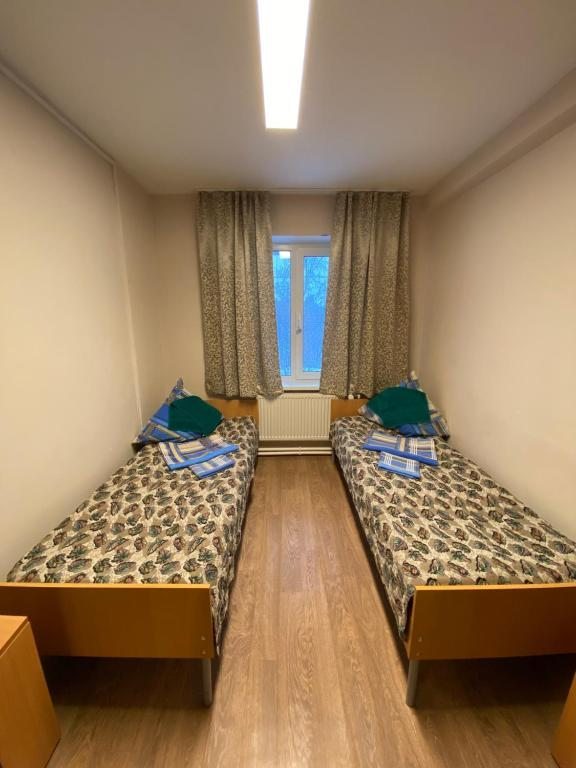 Двухместный (Бюджетный двухместный номер с 2 отдельными кроватями) гостиницы На Западной, Ухта