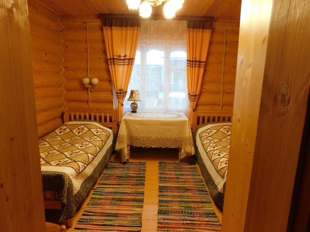 Двухместный (Бюджетный двухместный номер с 2 отдельными кроватями) гостевого дома Na beregu reki Sukhony Guesthouse, Тотьма