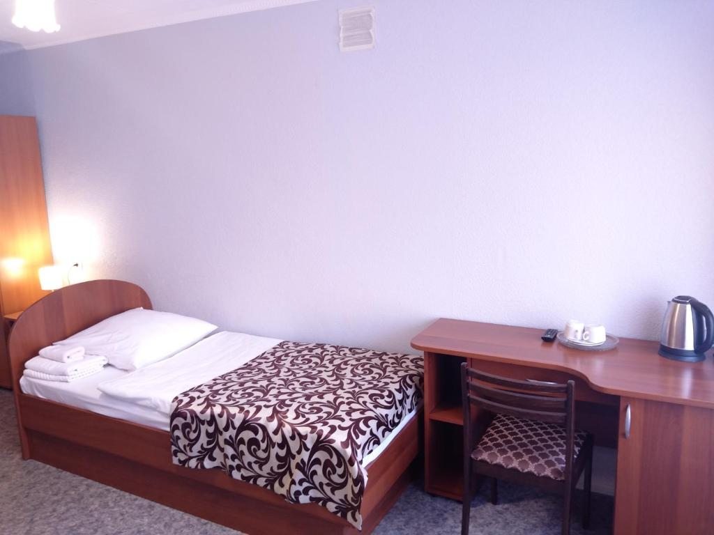 Двухместный (Бюджетный двухместный номер с 1 кроватью или 2 отдельными кроватями) отеля New Колос, Тюмень