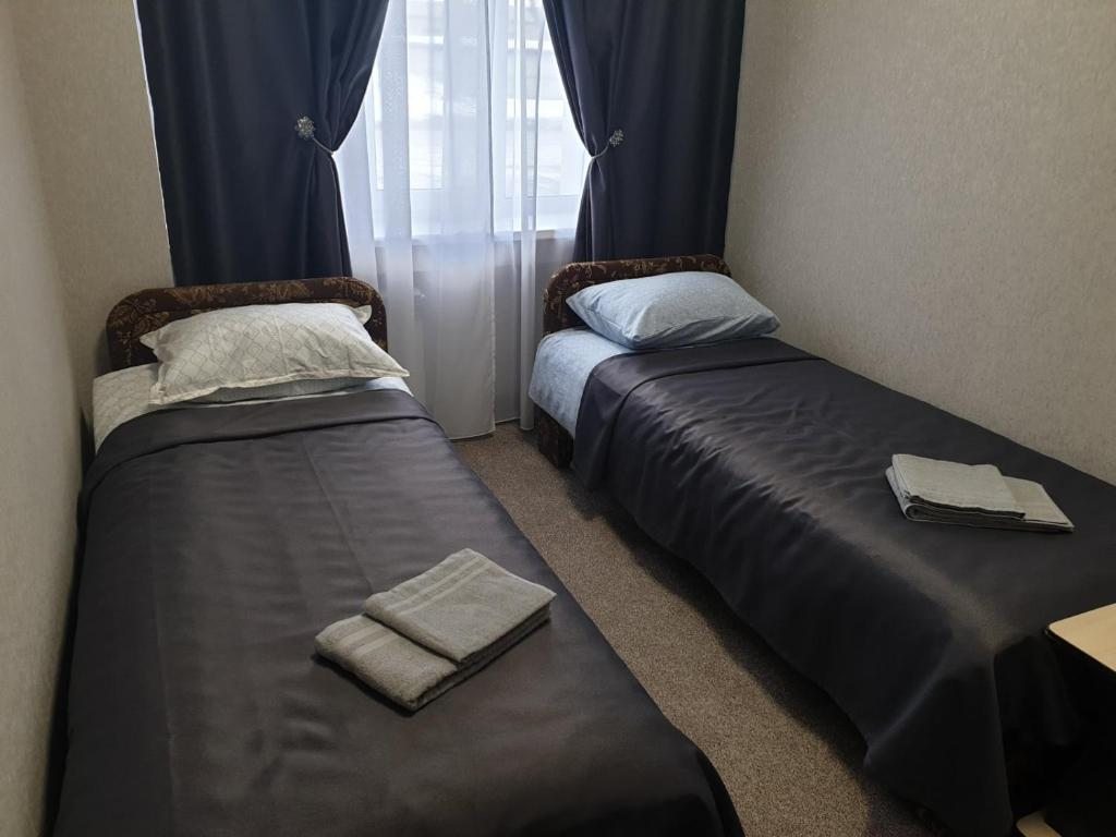 Двухместный (Односпальная кровать в общем двухместном номере) гостиницы Виктория на Карла Маркса, Тюмень