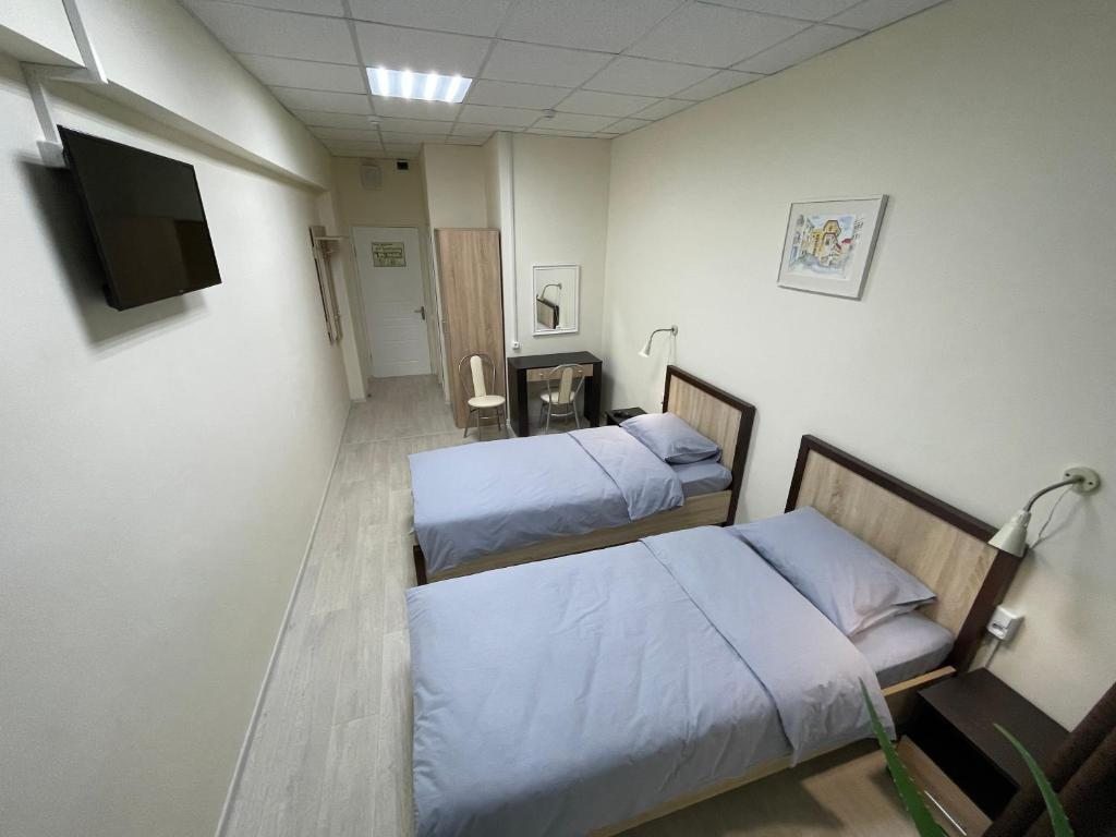 Двухместный (Двухместный номер с 2 отдельными кроватями и ванной комнатой) отеля ЛюксСон, Ковров