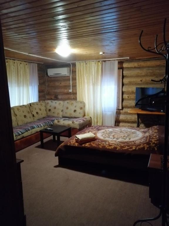 Двухместный (Двухместный номер Делюкс с 1 кроватью или 2 отдельными кроватями, вид на сад) мини-отеля GuestHouse Izba, Самара