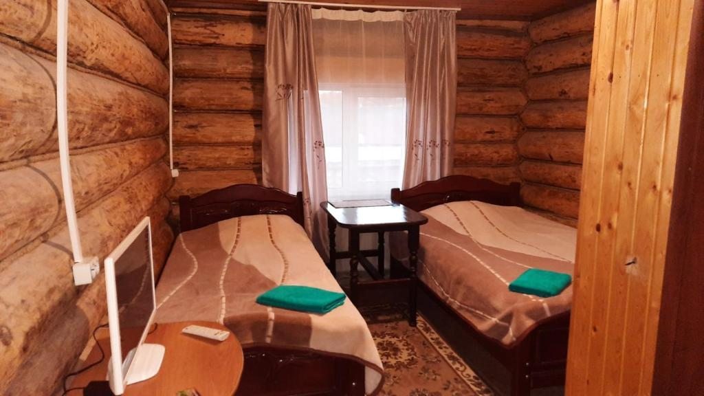 Двухместный (Двухместный номер с 2 отдельными кроватями,или с одной большой) мини-отеля GuestHouse Izba, Самара