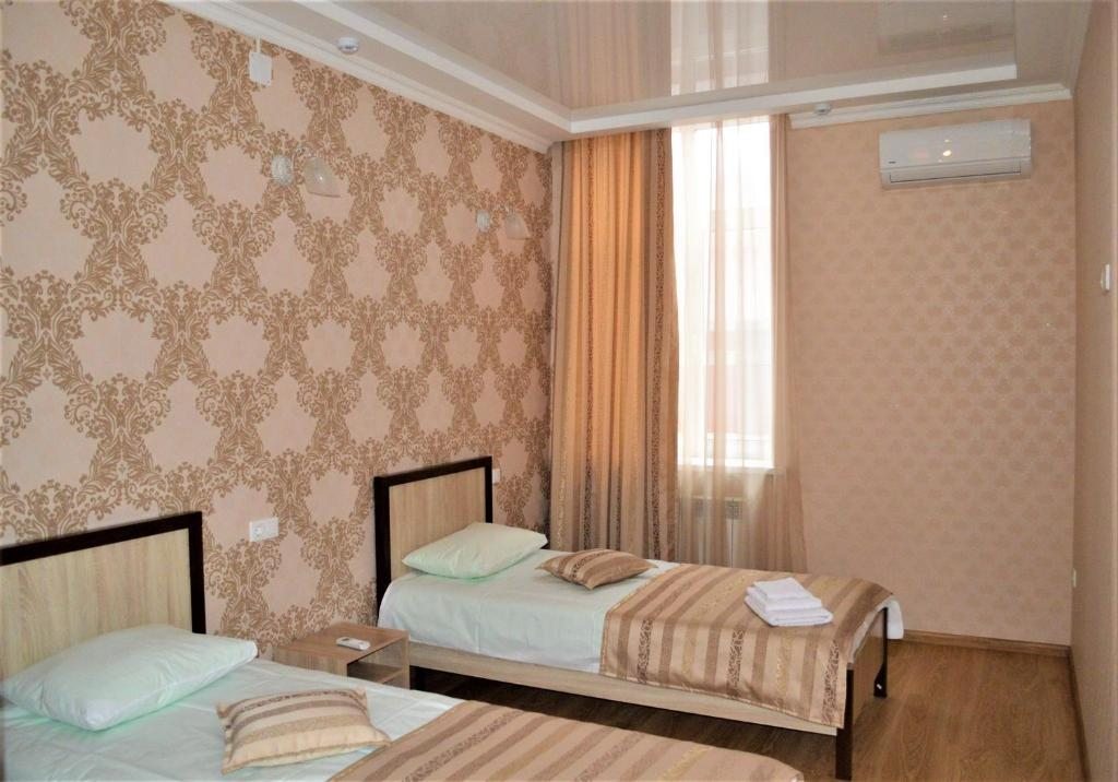 Двухместный (Двухместный номер с 2 отдельными кроватями и душем) отеля Метрополь, Самара