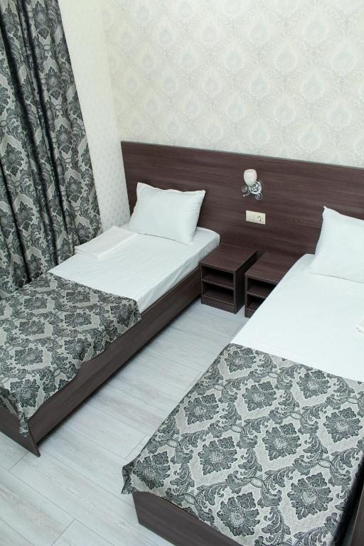 Двухместный (Двухместный номер с 2 отдельными кроватями) отеля DWIN, Волгоград