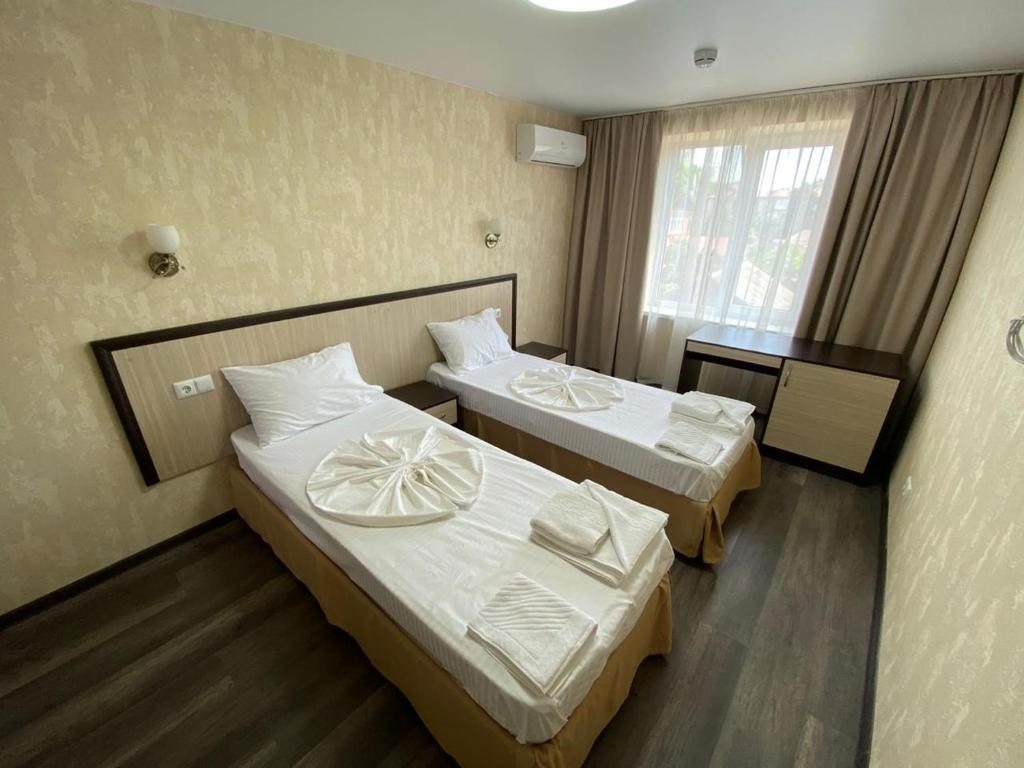 Двухместный (Двухместный номер с 2 отдельными кроватями) отеля Вилла де Луиза, Лазаревское