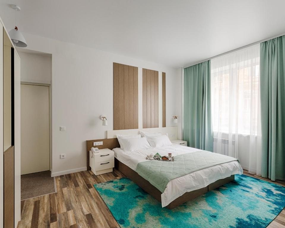 Двухместный (Большой двухместный номер с 1 кроватью или 2 отдельными кроватями) мини-отеля Девять комнат, Владивосток