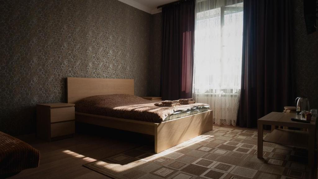 Двухместный (Двухместный номер с 2 отдельными кроватями и душем) гостиничного комплекса Domodedovo, Домодедово