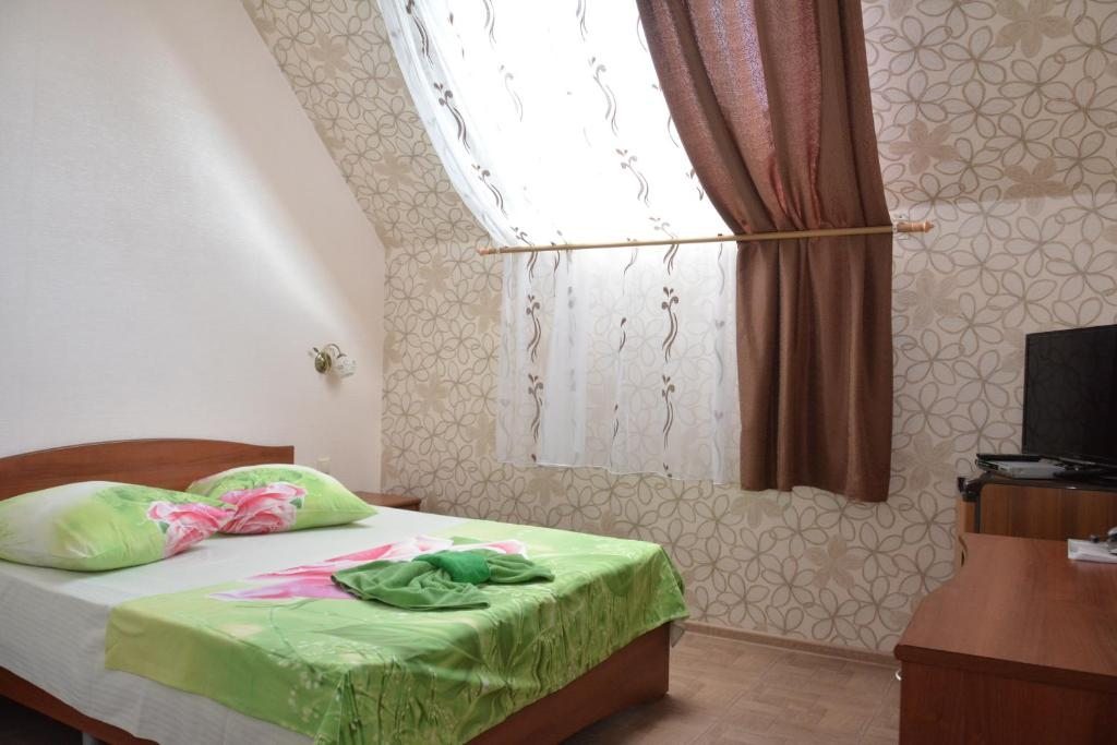 Двухместный (Стандартный двухместный номер с 2 отдельными кроватями) отеля Guest House Stary Oskol, Старый Оскол