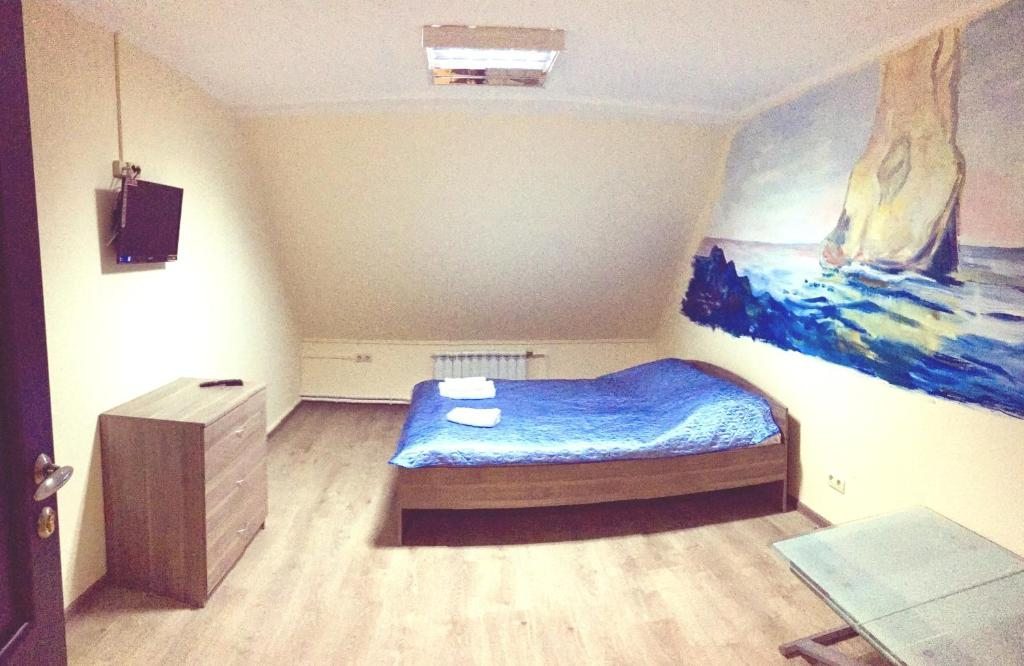 Двухместный (Двухместный номер с 1 кроватью или 2 отдельными кроватями, общая ванная комната) отеля Мини-гостиница Монэ, Нахабино