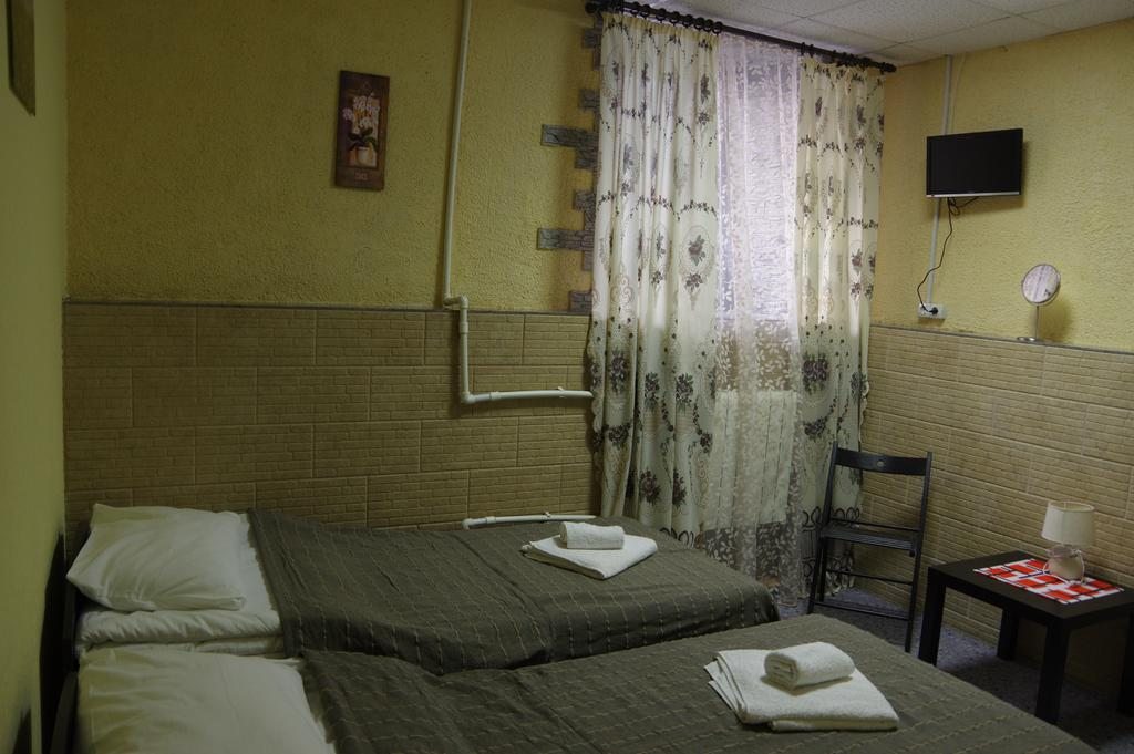 Двухместный (Бюджетный двухместный номер с 2 отдельными кроватями) мини-отеля Трио, Санкт-Петербург