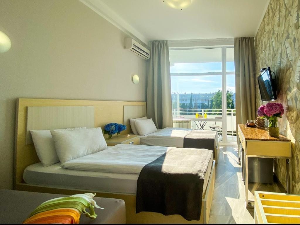 Двухместный (Двухместный номер с 2 отдельными кроватями и видом на море) отеля Мира, Сочи