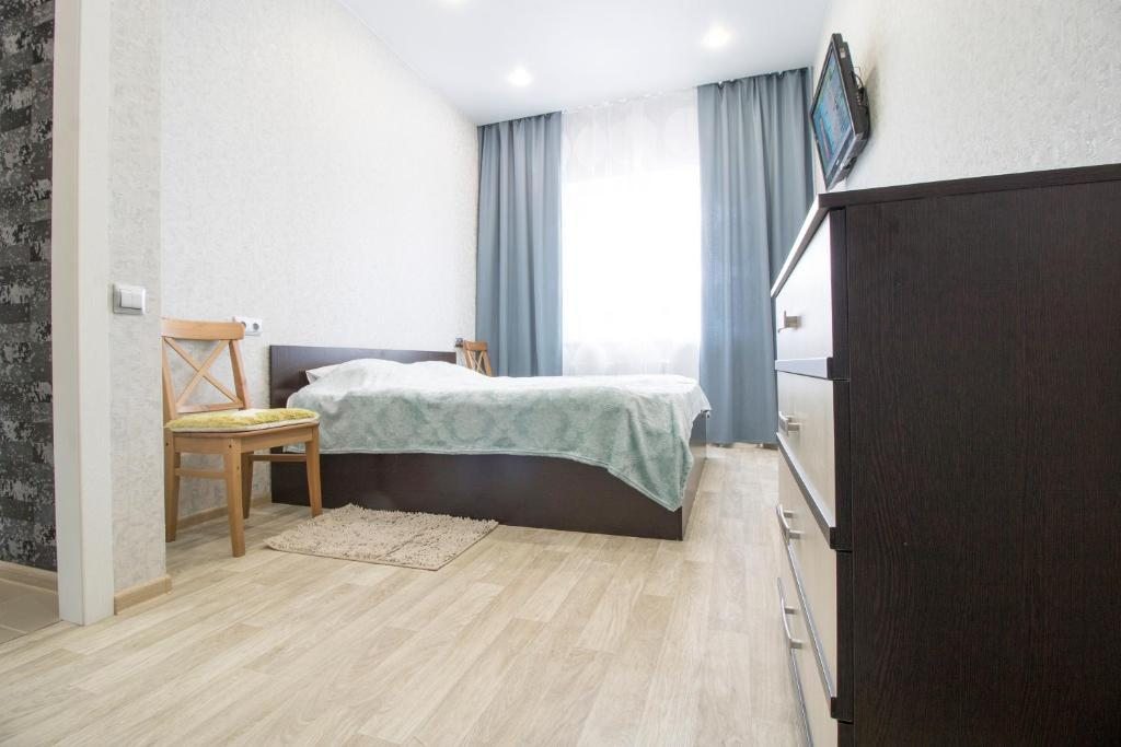 Двухместный (Большой двухместный номер с 1 кроватью или 2 отдельными кроватями) апартамента Orange Inn в Приморске