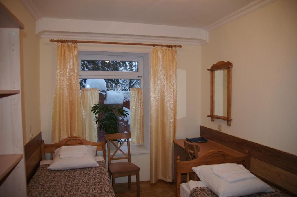 Двухместный (Двухместный номер с 2 отдельными кроватями) гостевого дома ЛИР, Песочный