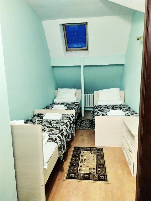 Номер (Односпальная кровать в общем номере) отеля Александровский парк Пушкин