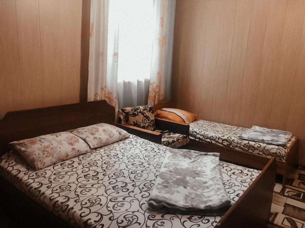 Четырехместный (Четырехместный номер эконом-класса с общей ванной комнатой) гостевого дома Ушакова 11, Лазаревское