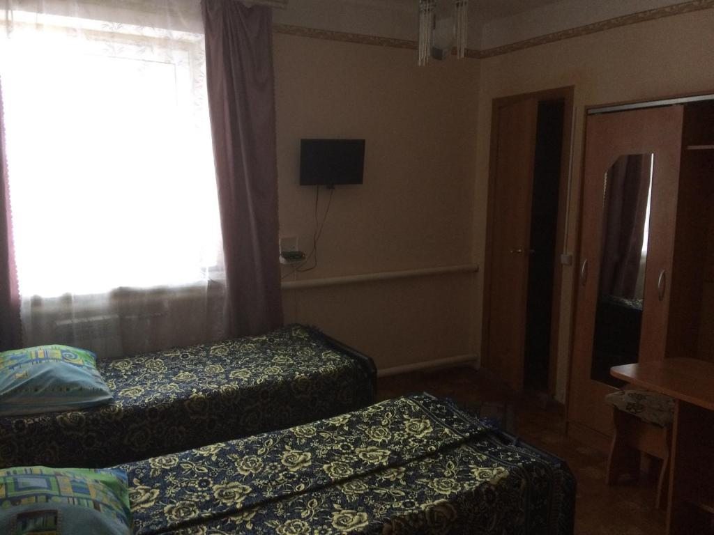 Двухместный (Улучшенный двухместный номер с 2 отдельными кроватями) мотеля ДонСервис, Калач-на-Дону
